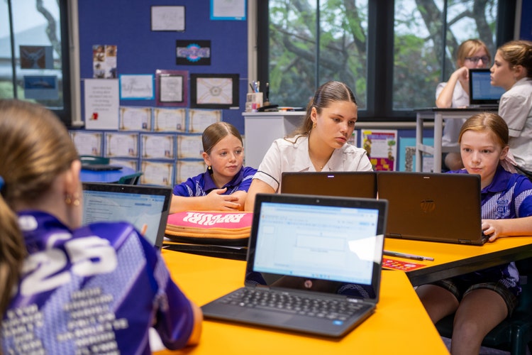 Students in classroom on laptops