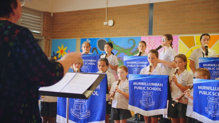 Music performance, kids playing recorder