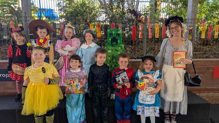 Students and teacher dressed up in book week costume