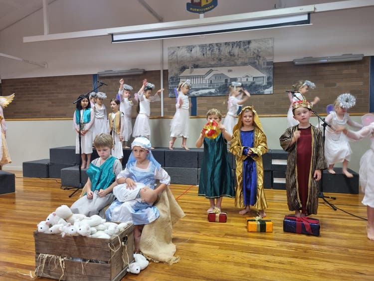 Infant students performing the Nativity on stage